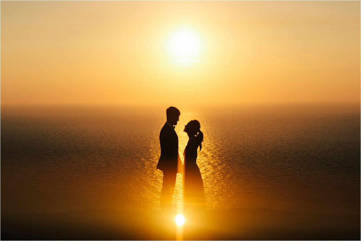 a bride and groom at sunset in London by London wedding photographer Liam Crawley