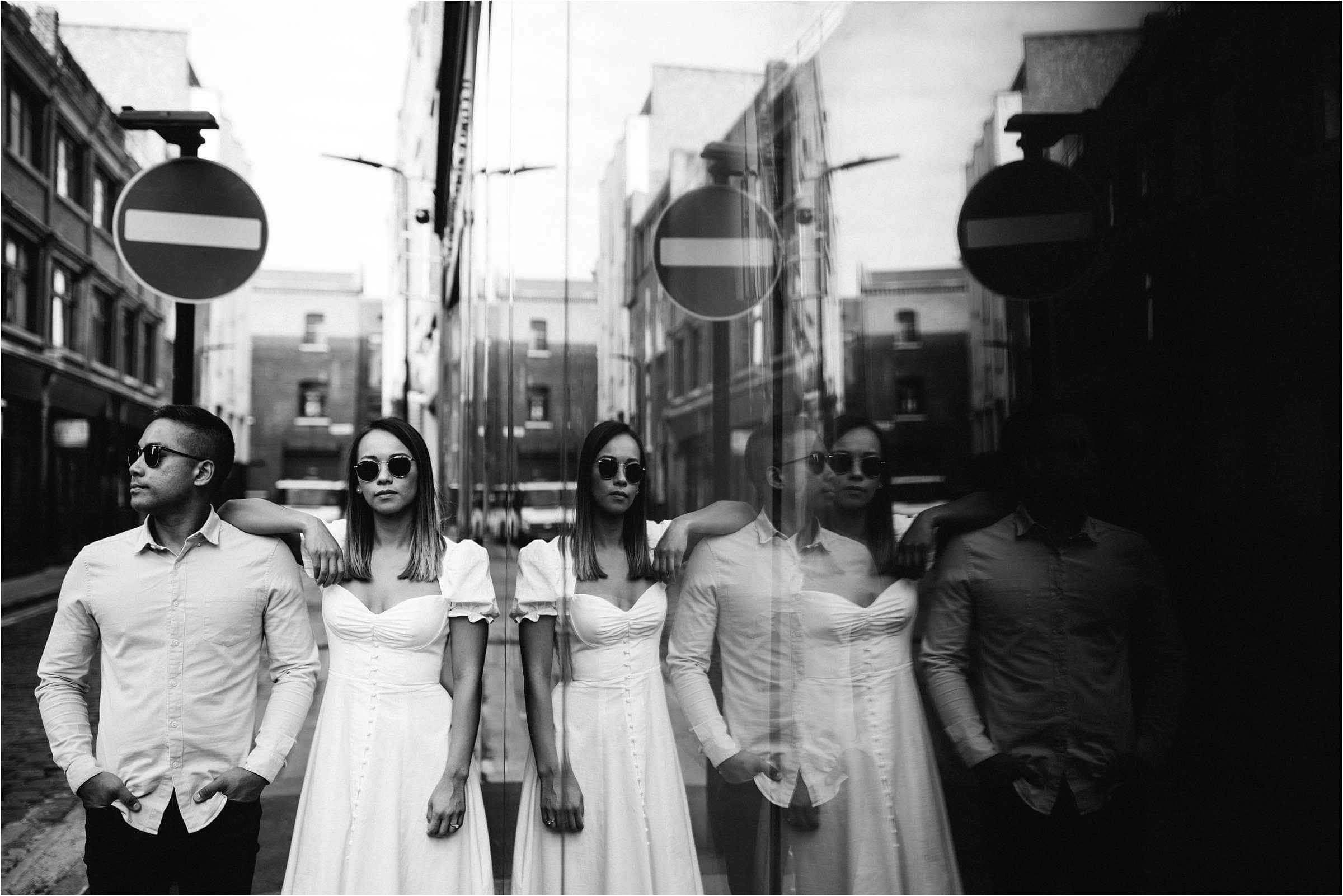 a bride and groom being photographed by a london wedding photographer